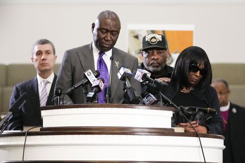 Civil rights attorney Ben Crump speaks at a news conference with the family of Tyre Nichols, who died after being beaten by Memphis police officers, as RowVaughn Wells, mother of Tyre, right, and Tyre's stepfather Rodney Wells, along with attorney Tony Romanucci, left, also stand with Crump, in Memphis, Tenn., Monday, Jan. 23, 2023. 