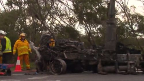 Thousands of litres of alcohol spilled onto the road. (9NEWS)