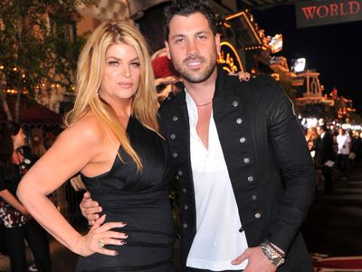 Kirstie Alley and dancer Maksim Chmerkovskiy arrive at the world premiere of "Pirates Of The Caribbean: On Stranger Tides" at Disneyland on May 7, 2011 in Anaheim, United States.