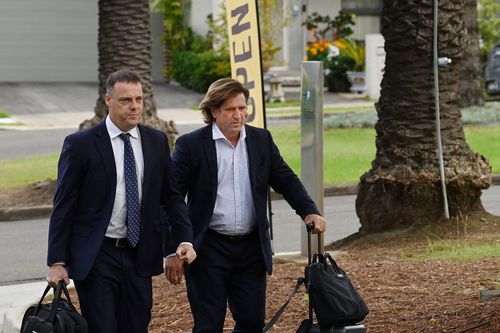 Former Manly Sea Eagles coach Des Hasler (right) arrives at the Coroners Court for the Kieth Titmuss inquest. Lidcombe, NSW. February 9, 2024.