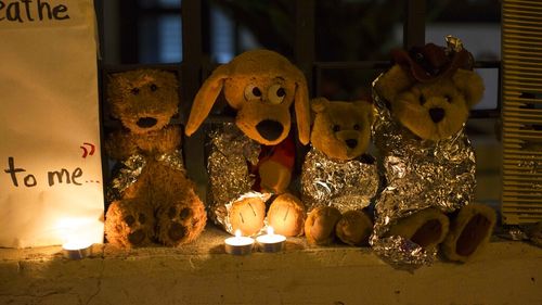Stuffed toy animals wrapped in aluminum foil representing migrant children separated from their families are displayed in protest in front of the United States embassy in Guatemala City.