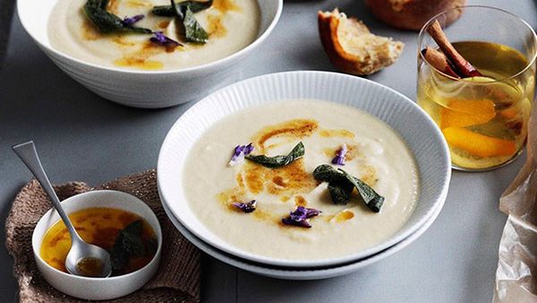 Roast garlic and parsnip soup with lemon butter and sage