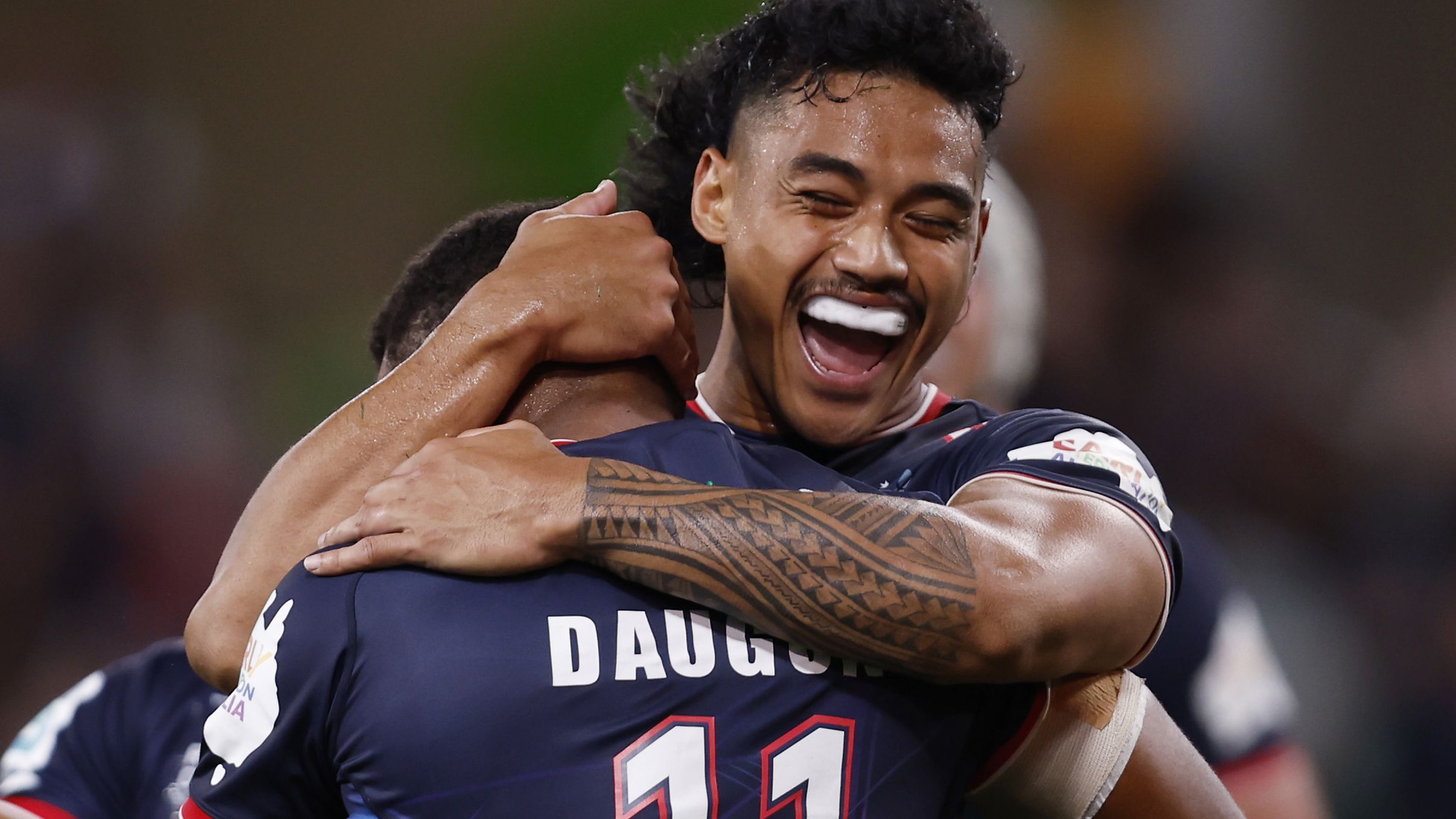 Filipo Daugunu of the Rebels celebrates a try during the round two Super Rugby Pacific match between Melbourne Rebels and Western Force at AAMI Park.