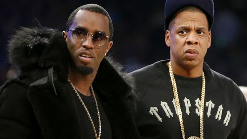 FILE - Rap moguls Sean "Diddy" Combs, left, and Jay-Z attend the NBA All-Star basketball game, Feb. 15, 2015, in New York. (AP Photo/Kathy Willens, File)