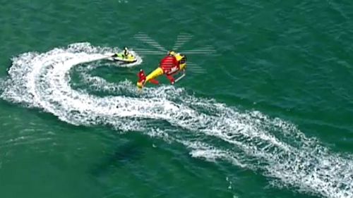 The Westpac helicopter monitoring the shark.