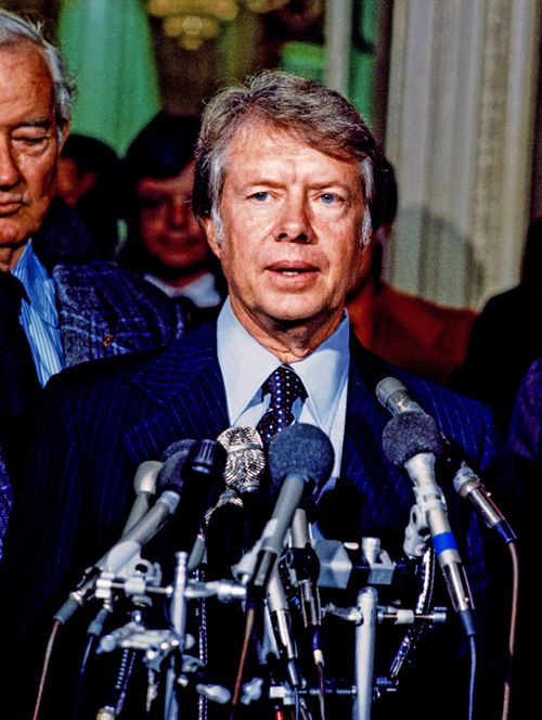 United States President-elect Jimmy Carter meets reporters after meeting with Congressional leaders in the US Capitol in Washington, DC on November 23, 1976