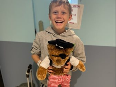 Eli with his Kids' Cancer Project bear