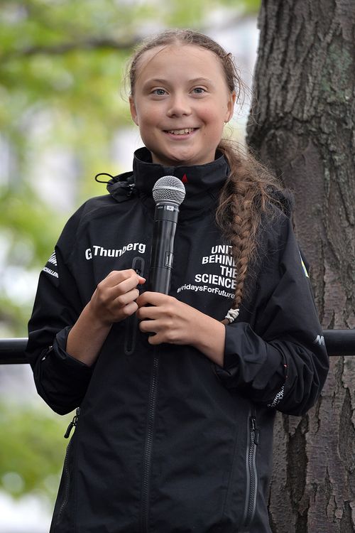 The Swedish teen climate activist attends an press conference after arriving in New York harbor after a 15-day journey aboard a zero-emission sailboat across the Atlantic.
