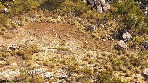 Police searching for creator of ‘SOS’ sign found in the Kimberley