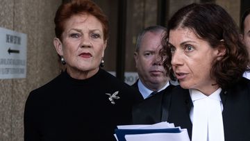 Hanson forced to watch old videos of herself in bitter hate speech trial