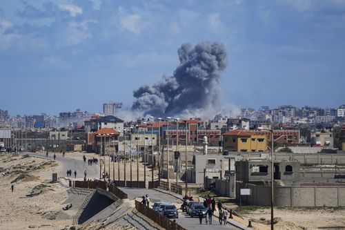 Smoke rises following an Israeli airstrike in the central Gaza Strip, Friday, March 15, 2024. 