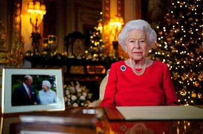 Queen Elizabeth II records her annual Christmas broadcast in Windsor Castle, Windsor, England. The photograph at left shows The Queen and Prince Philip taken in 2007 at Broadlands to mark their Diamond wedding anniversary. 