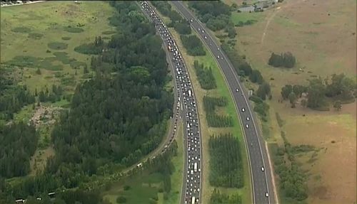 Sydney news Hume Highway crash car caravan