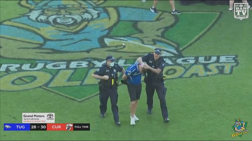 A video shows police and security taking down the man in the middle of C-BUS stadium.