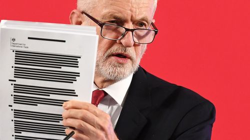 Jeremy Corbyn hold redacted document on NHS