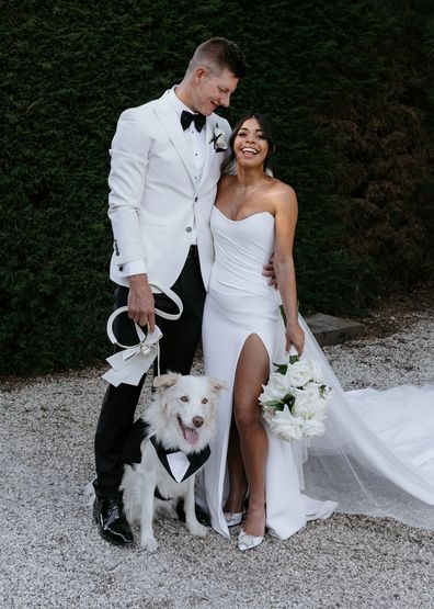 Todd and Vanessa Van Der Haar at their wedding with dog Ollie.