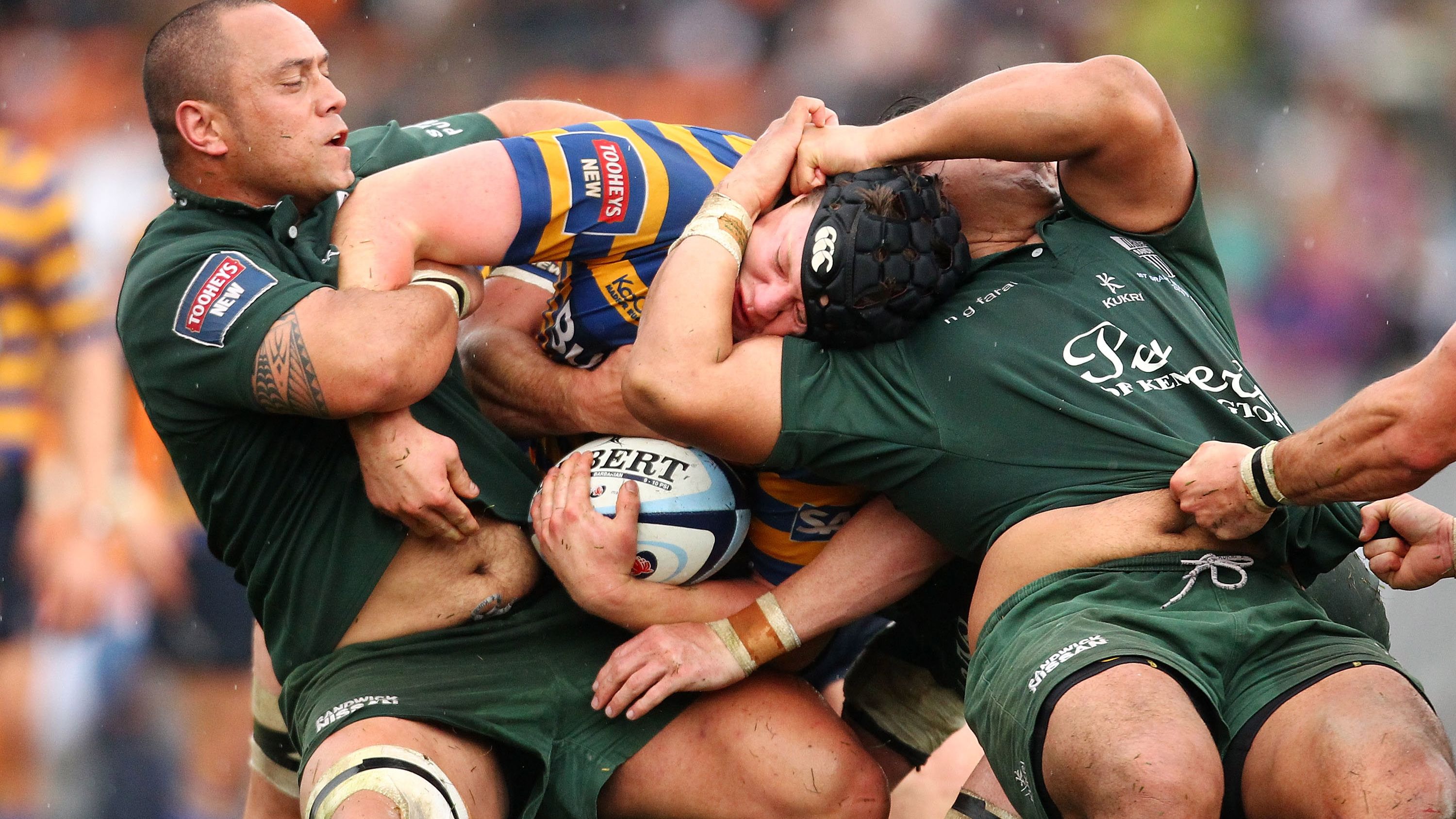 Paddy Ryan of Sydney Uni is tackled around the head during the 2010 Shute Shield final.