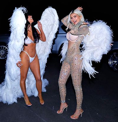 Kim Kardashian and Kylie Jenner stun in their Victoria's Secret costumes.