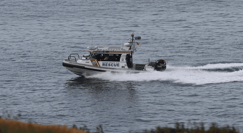 Search and rescue team look for missing surfer Darcy