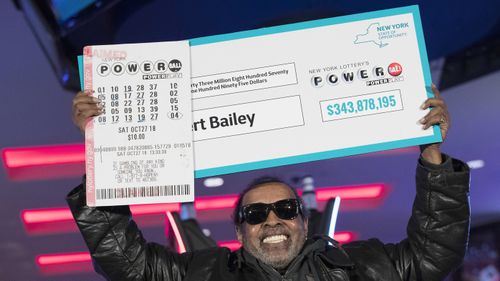 Harlem man Robert Bailey with his prize. New York lottery winners are required to hold a press conference.