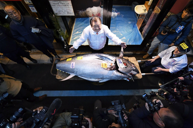 Kiyoshi Kimura, president of Kiyomura Corp, operator of Japanese sushi chain Sushizanmai, wins the New Year's auction in Tokyo on Jan. 5, 2020, with a bid of 193.2 million yen ($1.8 million) for a bluefin tuna, the second-highest price on record. 