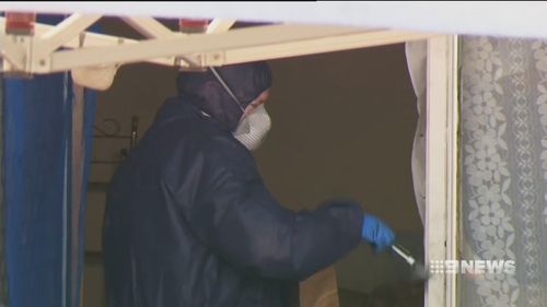 Forensic officers comb the house for evidence. Picture: 9NEWS