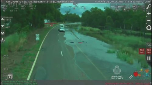 The motorist was cut off by floodwaters in Forbes.