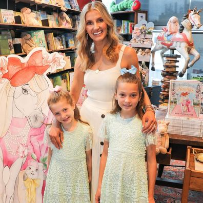 Kate Waterhouse and her two daughters at her children's book launch. 