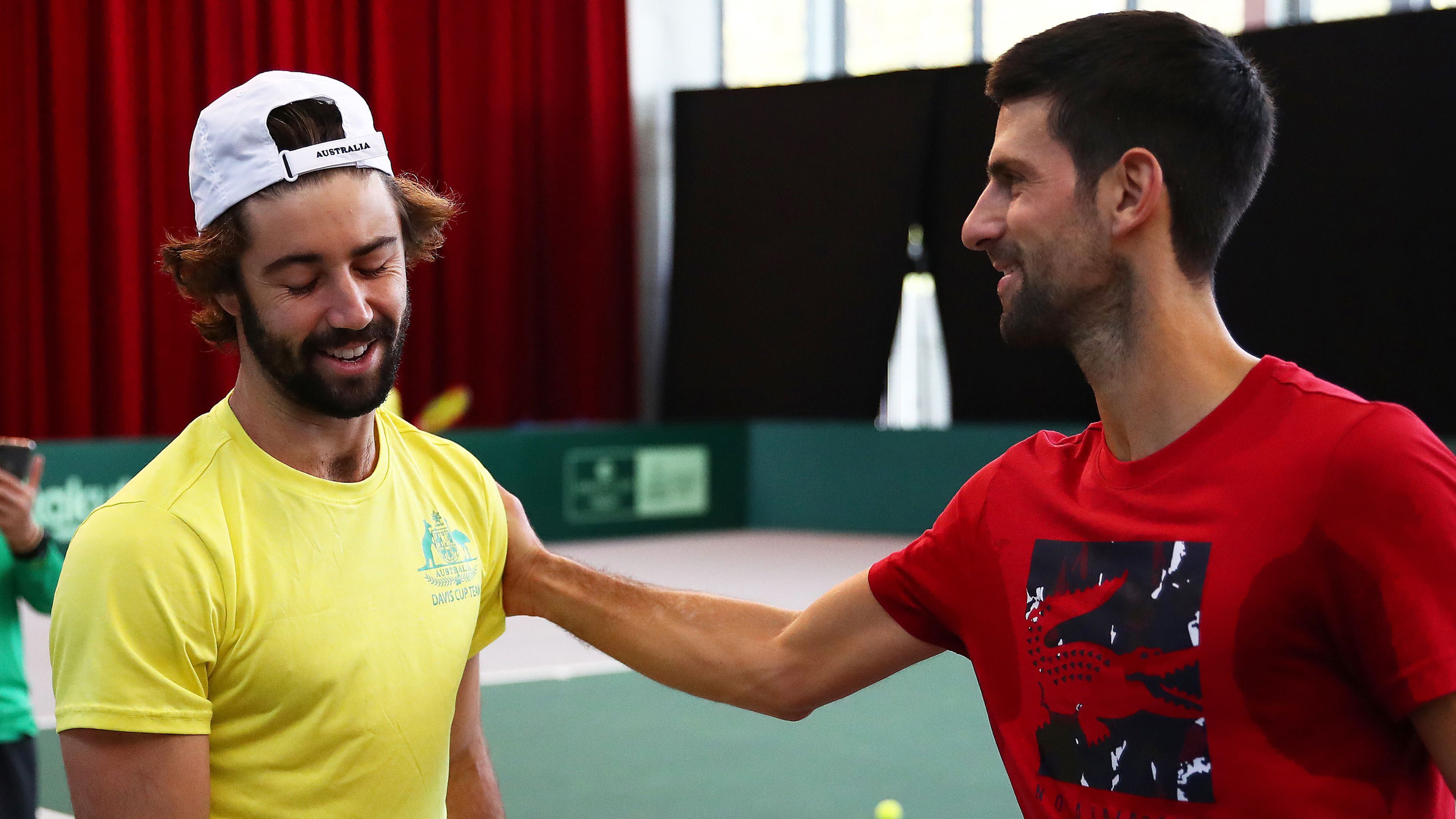 Novak Djokovic and Jordan Thompson after a Davis Cup practice session in 2019 in Madrid.
