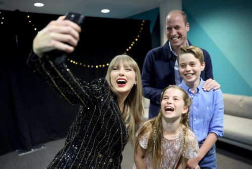 Taylor Swift takes a selfie with Prince William, Prince George and Princess Charlotte at Wembley Stadium, London