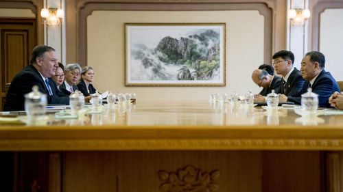 Mike Pompeo (left) meeting with North Korean officials in Pyongyang. (AAP)