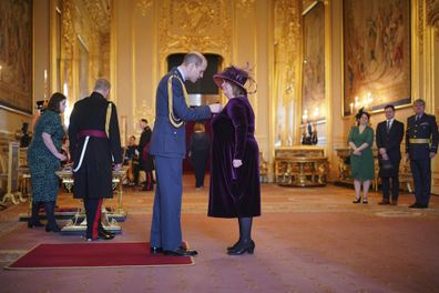 Suzanne Hutchinson, Chief Executive of Little Hearts Matter, right, is made a Member of the Order of the British Empire by Britain's Prince William, Prince of Wales, at Windsor Castle