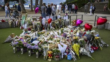 Flowers are laid down at a children&#x27;s playground in Annecy, France, Saturday, June 10, 2023 following a knife attack on Thursday, June 8, 2023.  