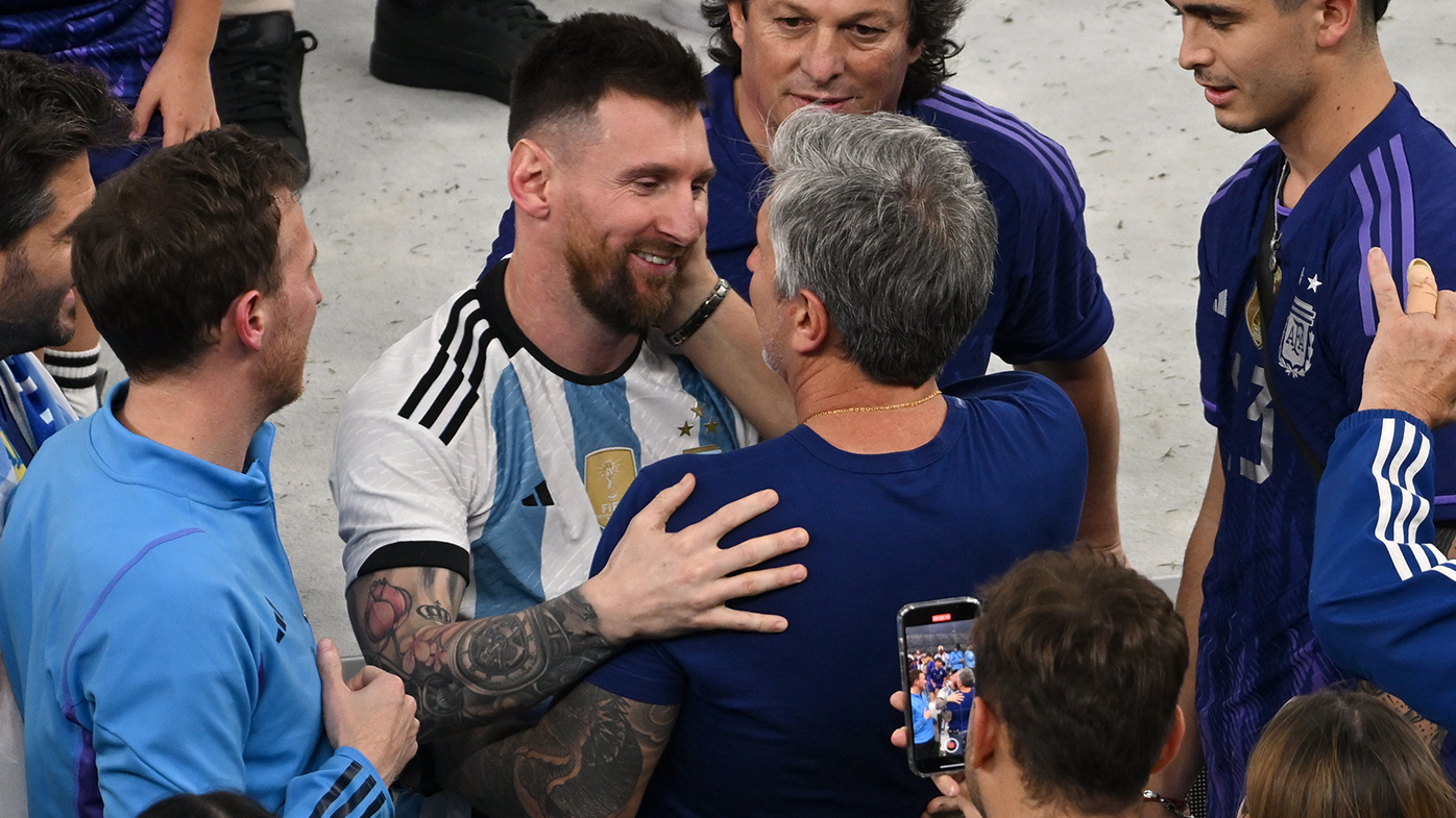 Argentina&#x27;s Lionel Messi embraces his father Jorge Messi after the 2022 FIFA World Cup award ceremony.