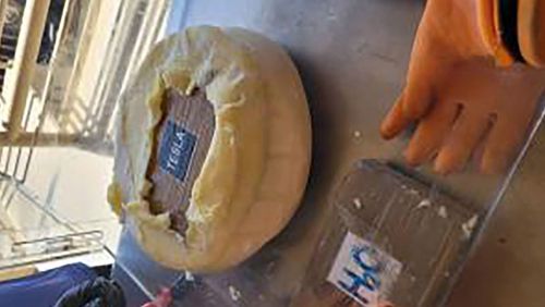US Customs and Border Protection officers seized wheels of cheese filled with cocaine at the Texas border.