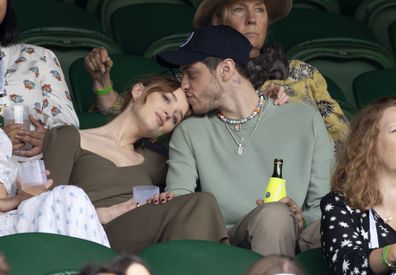 Phoebe Dynevor and Pete Davidson hosted by Lanson attend day 6 of the Wimbledon Tennis Championships.