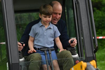 William and Louis take a turn at the escavator