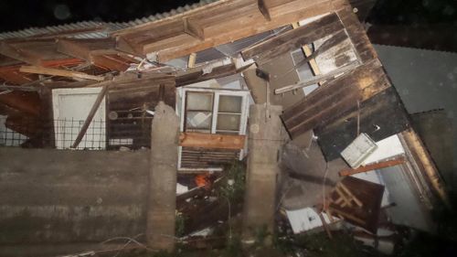 A home destroyed by a tsunami in Los Vilos. (Citizen Corporation National Emergency Network)