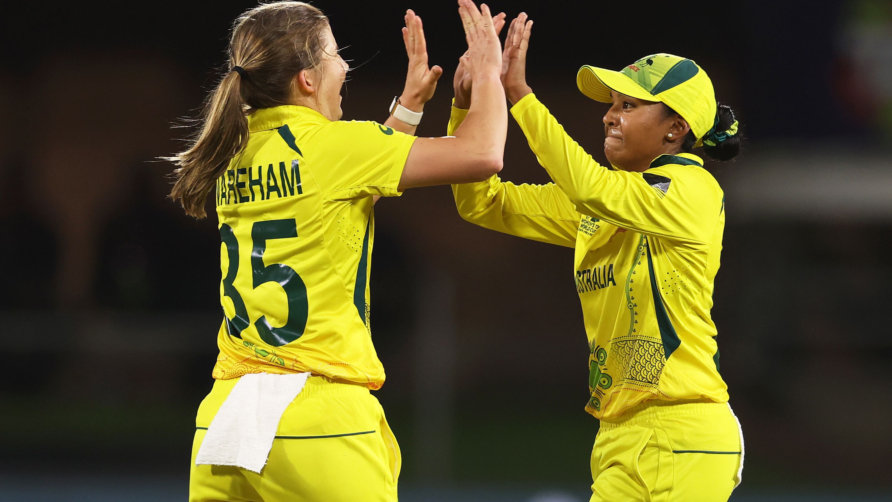 GQEBERHA, SOUTH AFRICA - FEBRUARY 14: Georgia Wareham of Australia celebrates the wicket of Sobhana Mostary of Bangladesh with team mate Alana King during the ICC Women&#x27;s T20 World Cup group A match between Australia and Bangladesh at St George&#x27;s Park on February 14, 2023 in Gqeberha, South Africa. (Photo by Matthew Lewis-ICC/ICC via Getty Images)
