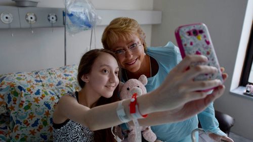 Chile president visits girl who posted euthanasia video online
