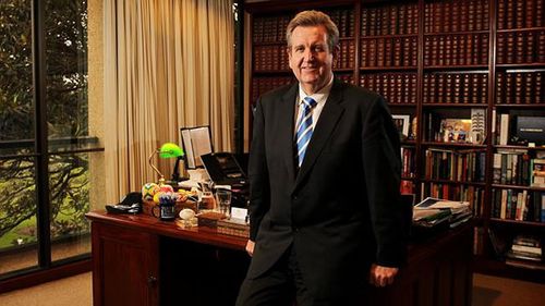 Former NSW premier Barry O'Farrell at the desk.
