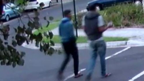 Two men seen in the hours before Mr Wang's death. It is not suggested the men are involved. (Victoria Police)