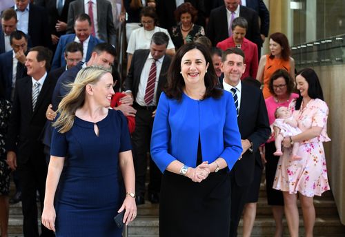 Queensland Premier Annastacia Palaszczuk (right) and Innovation, Tourism and Commonwealth Games Minister Kate Jones after the government's first caucus meeting yesterday. (AAP)