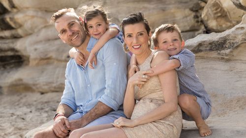 Louise with her husband Dominic and their two young children.