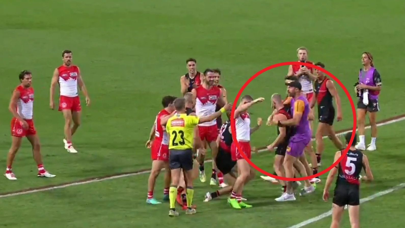 AFL to issue Bombers with 'please explain' after runner Travis Cloke enters Swans fracas
