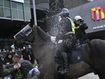 Dozens of police injured, 33 protesters arrested in Melbourne mayhem