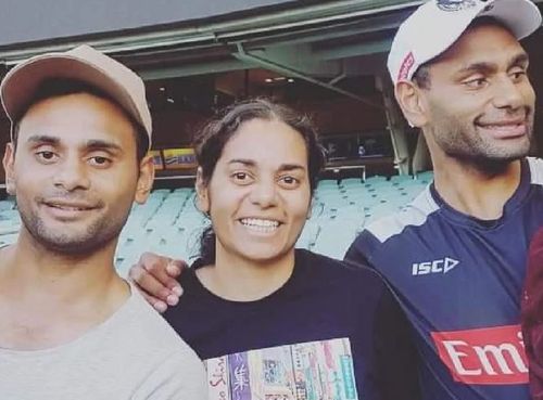 Maggie Varcoe (centre) with her brothers Adam and Travis. 