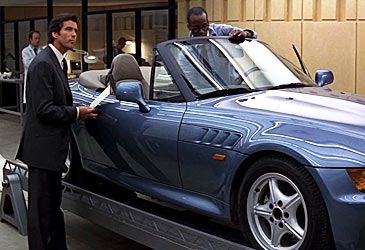 Which car was the controversial choice for Bond's primary vehicle in GoldenEye?