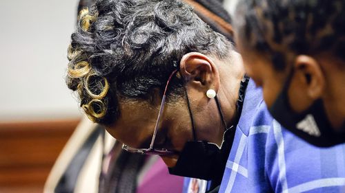 Ahmaud Arbery's mother Wanda Cooper-Jones reacts as Superior Court Judge Timothy Walmsley sentences Greg McMichael, his son, Travis McMichael, and a neighbour, William "Roddie" Bryan.