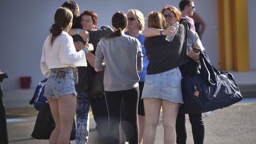 Evacuees arrive at the Somerville relief center on January 4, 2020 in Somerville, Australia. HMAS Choules was deployed to help evacuate thousands of people stranded in the remote Victorian coastal town of Mallacoota following fires across East Gippsland.